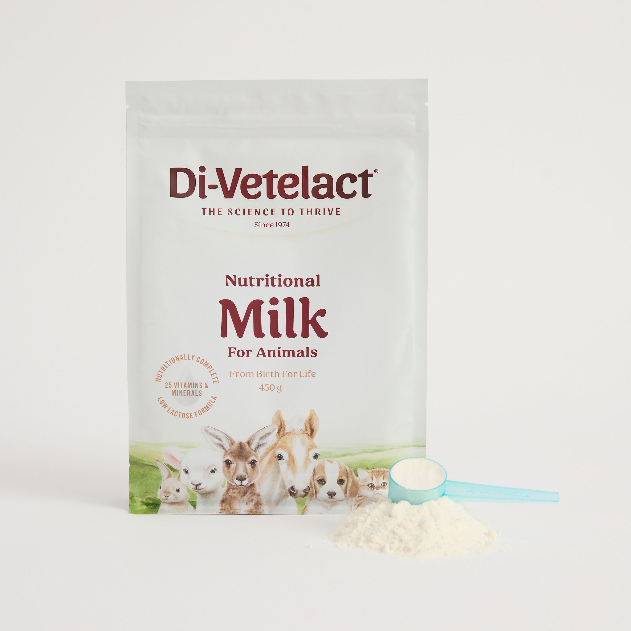 Di-Vetelact 450g Pouch with scoop and powder on white background