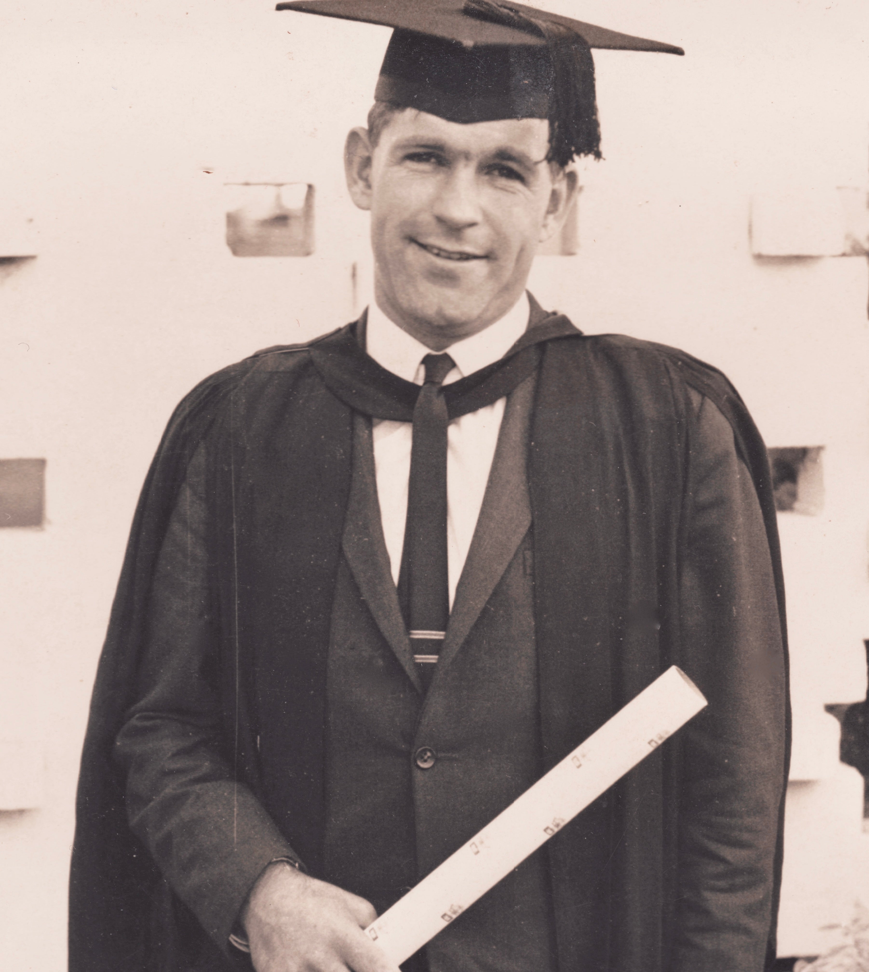 Michael Sharpe in Graduation cap and Gown from UNSW for Food Science Degree