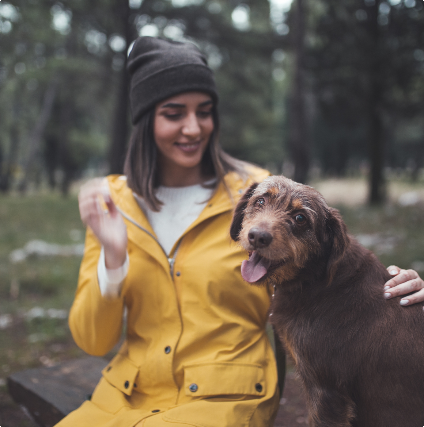 Woman with dog in a park